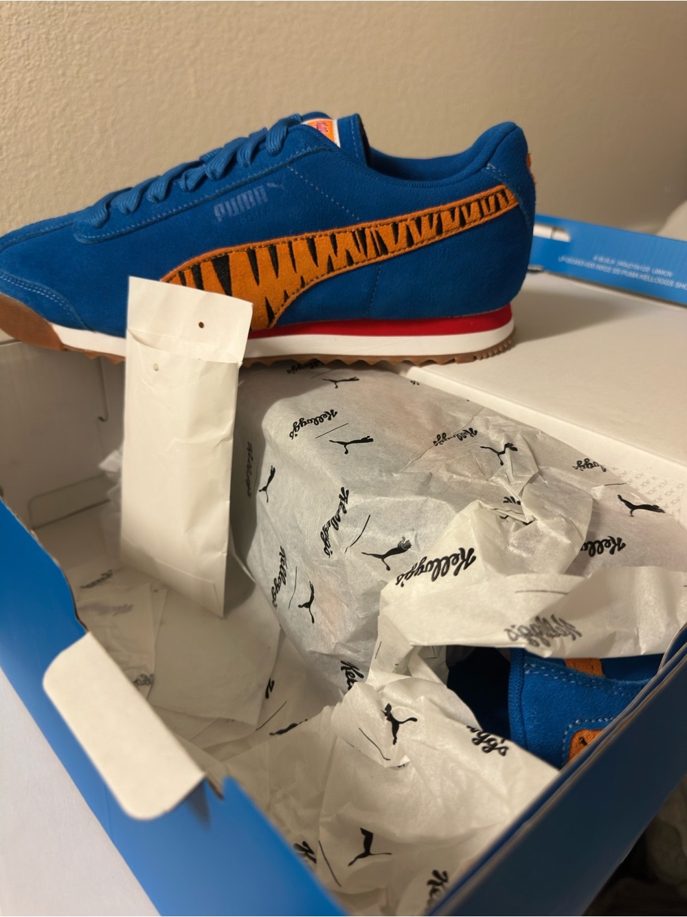 Puma Blue Box Featuring Orange Tiger Mascot